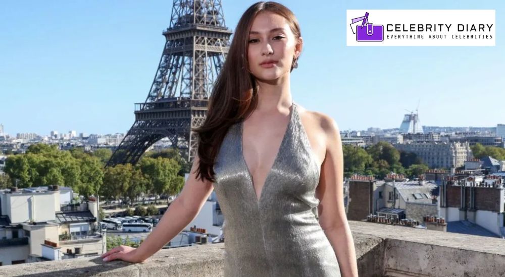 Lola Tung Shines in Paris With Stunning Dress at ‘TSITP’ Photocall