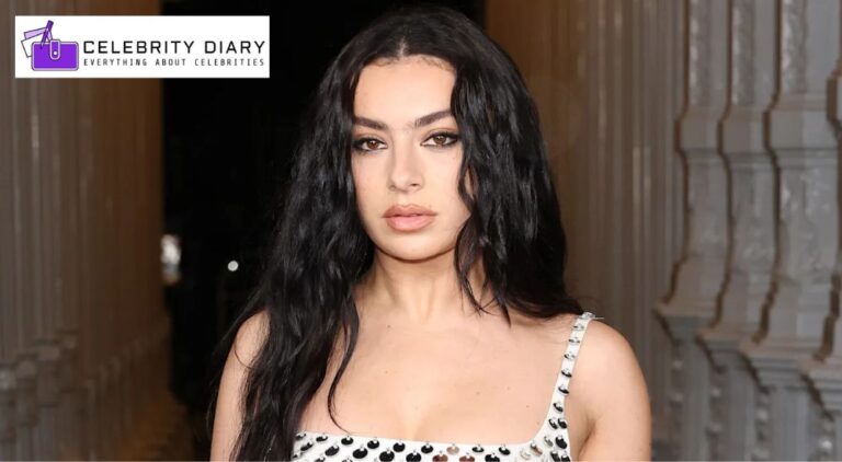 Charli XCX makes a surprise appearance on SNL wearing a Kansas City shirt during Role Model’s performance.